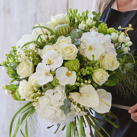Sympathy hand-tied made with the finest flowers